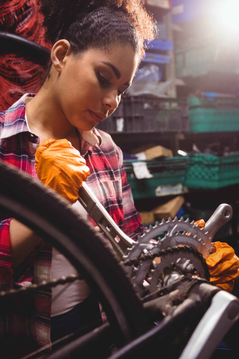 mechanic-repairing-bicycle (1) (1)